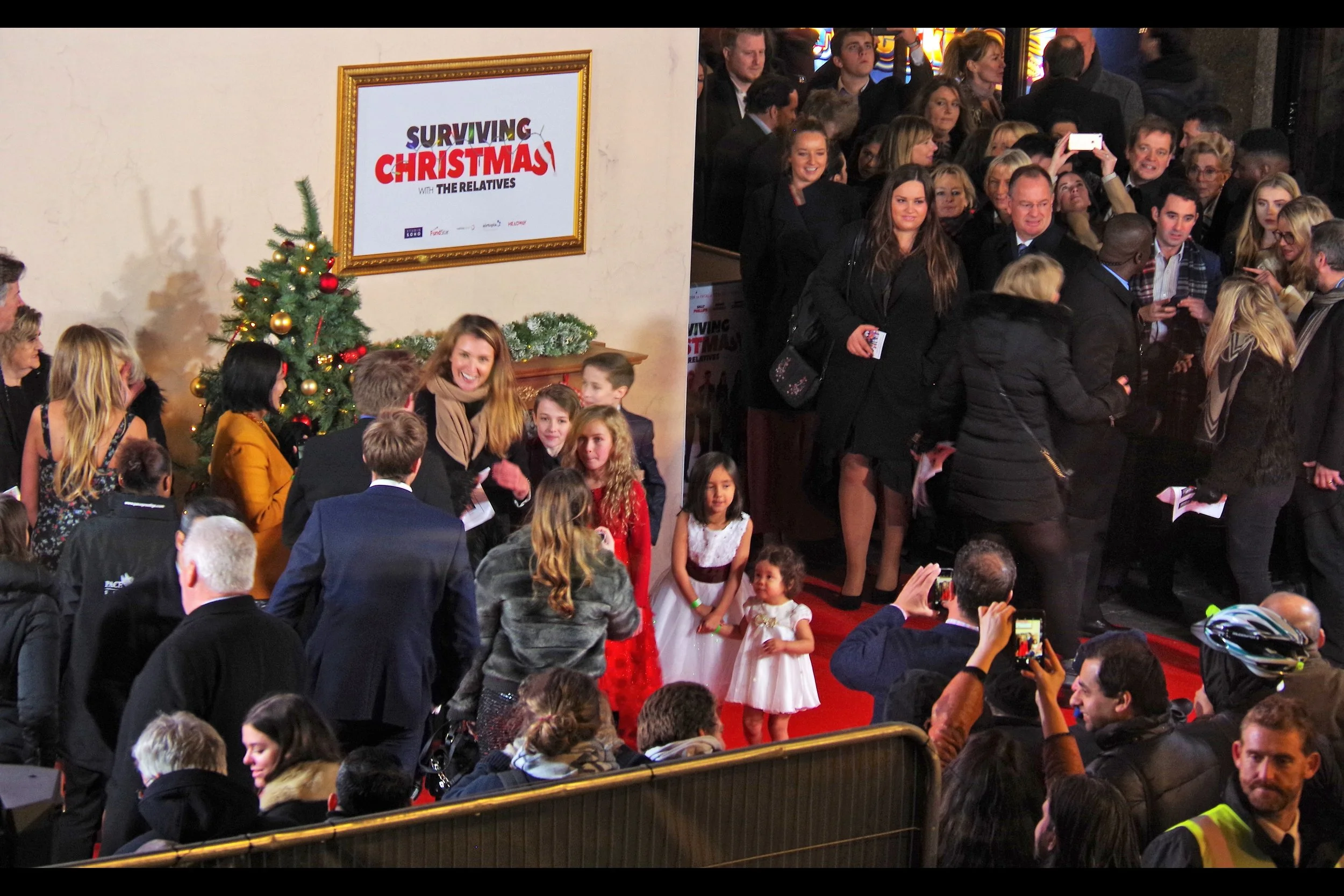 Now they’re letting kids on red carpets? They’ve already invaded my weekend cafes and, last time I was in one, a local pub! Honestly… this country needs to establish some legal heroin shooting galleries just so there’s a public place that screaming kids legally CAN’T be! Anyway I believe these ones are in the movie. They’re probably entitled to be here. Forget I said anything.
