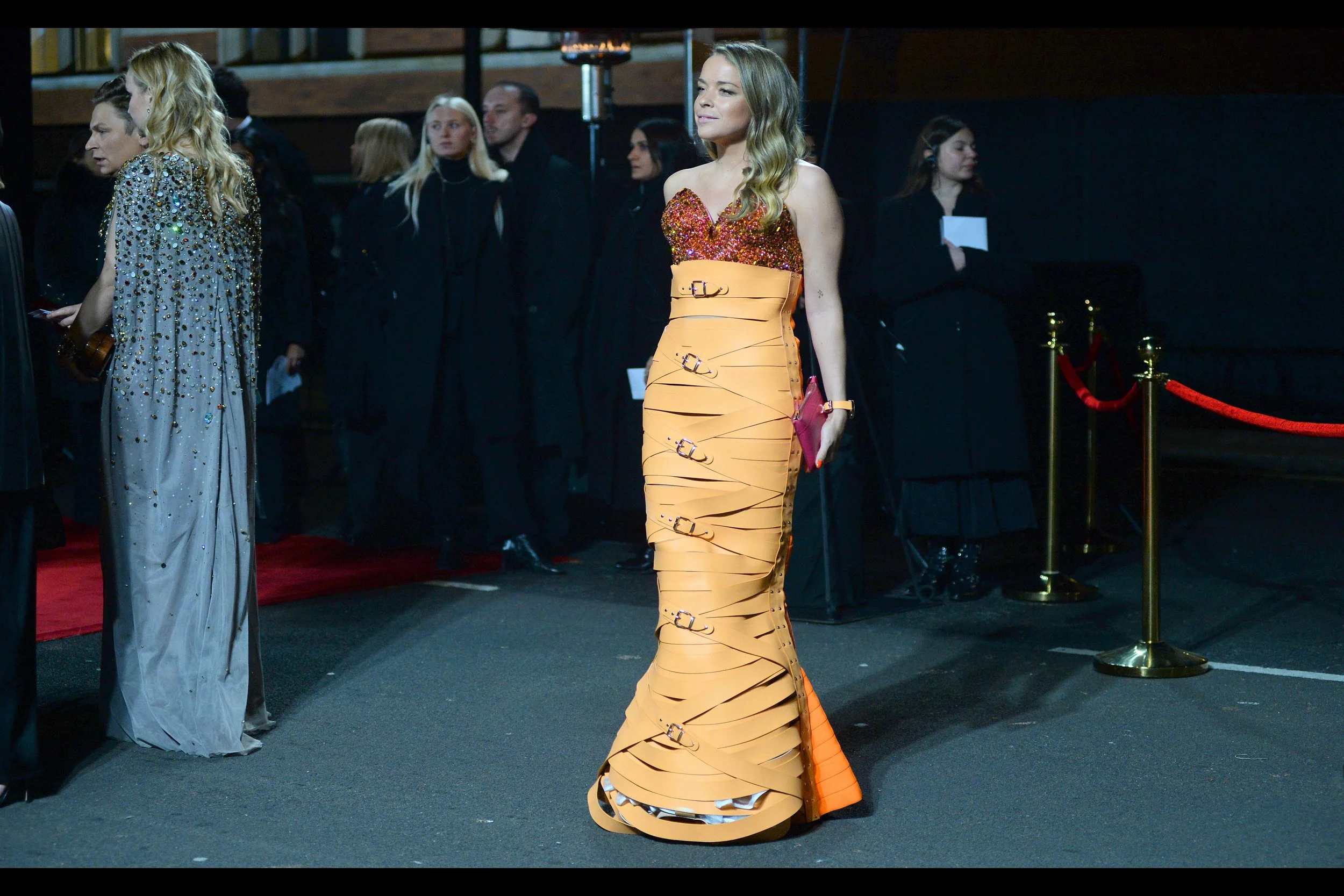 “Of course I can’t move… this is what fashion is all ABOUT, people” . I just wanna know what she’d do at an airport if they instructed her to remove all belts.