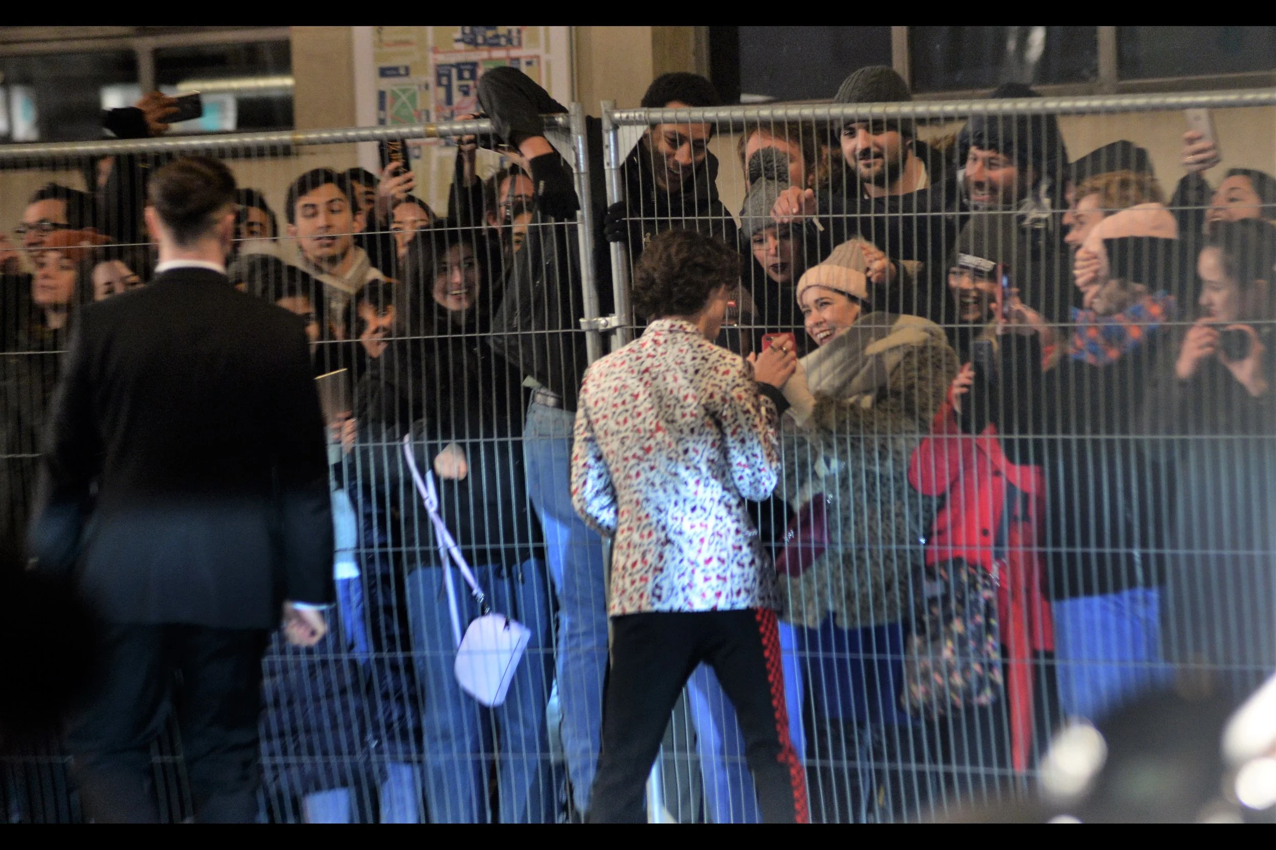 “Oh, if there was but no fence dividing us that stretched yonder for no more than five or six metres, we would be together right now, my darling!” - AND Timothee Chalamet crossed to the other side of the road to greet fans too. Impressive.