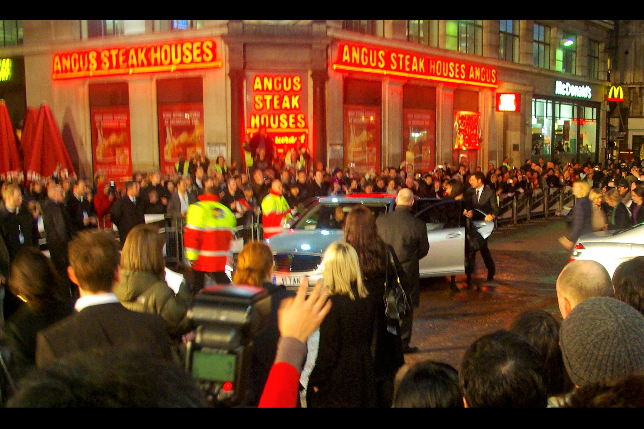 "Seriously, guys? I'm just here for the steak" . Actor Clive Owen arrives (insert "eeeee!!!!" here if you're female)