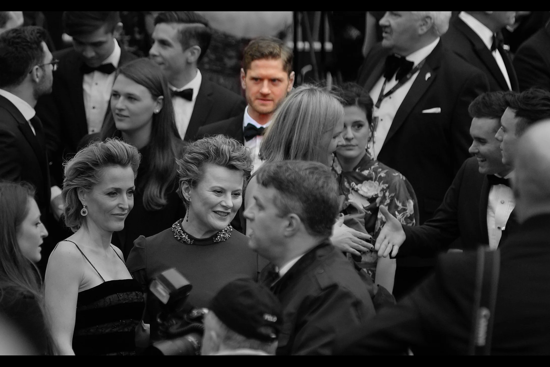 A few frames later in the same rapid 10-frame-per-second burst, and the blurry figure in the back may just be Kyle Soller , who won Best Actor for “Inheritance” on the night.
