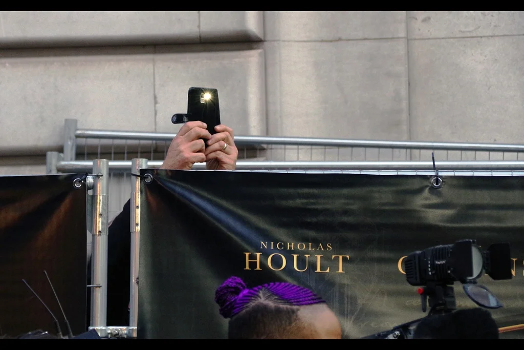 A single mobile phone is raised above the parapet, and I’m guessing that the same security staff (who supported, nay encouraged photography of this fashion a week ago) probably tasered this poor person and dragged them to some kind of non-extradition black-site. All Hail Disney.