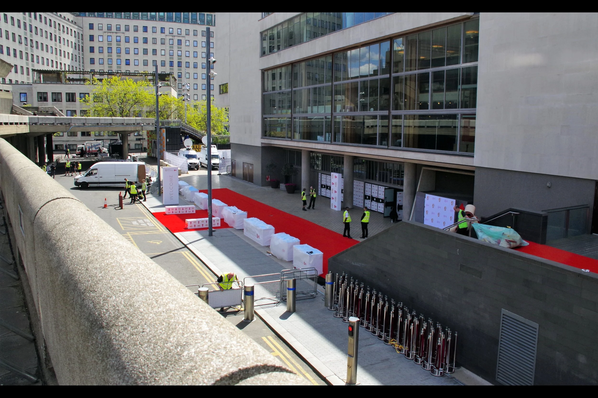 My spot this year is fairly similar to last year, but slightly worse, with a slight view down to drop-off, diagonally onto the first stair landing, and perpendicular to the top of the stairs with an angled view into the event, assuming it wasn’t blocked by security, attendees, PAs, organisers, photographers, guests, hangers-on, significant others, and … I dunno, passing seagulls and ravens.