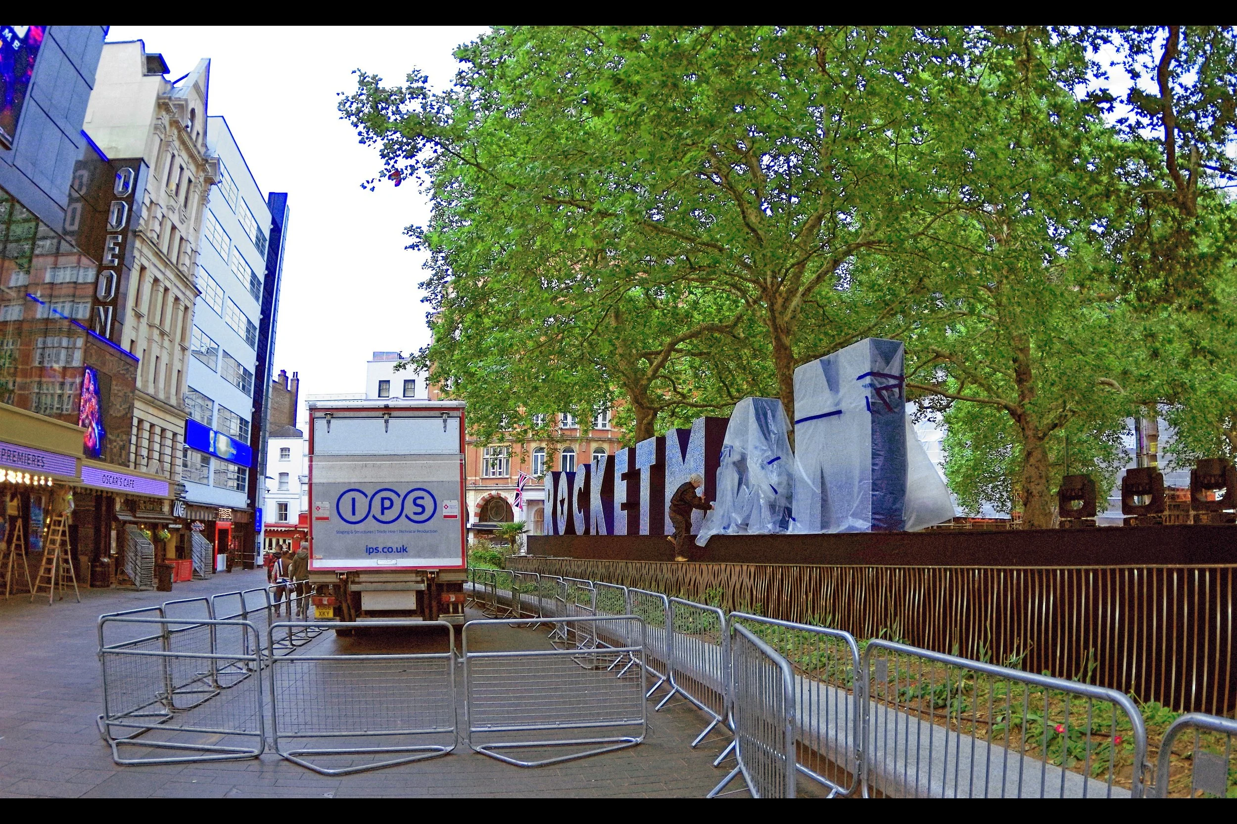 Meanwhile, outside the Odeon…. “What if he’d been born in Jamaica? They might have called the film ‘ROCKET,MON”!!” ”You should remember to have breakfast before you start work, Frank…”