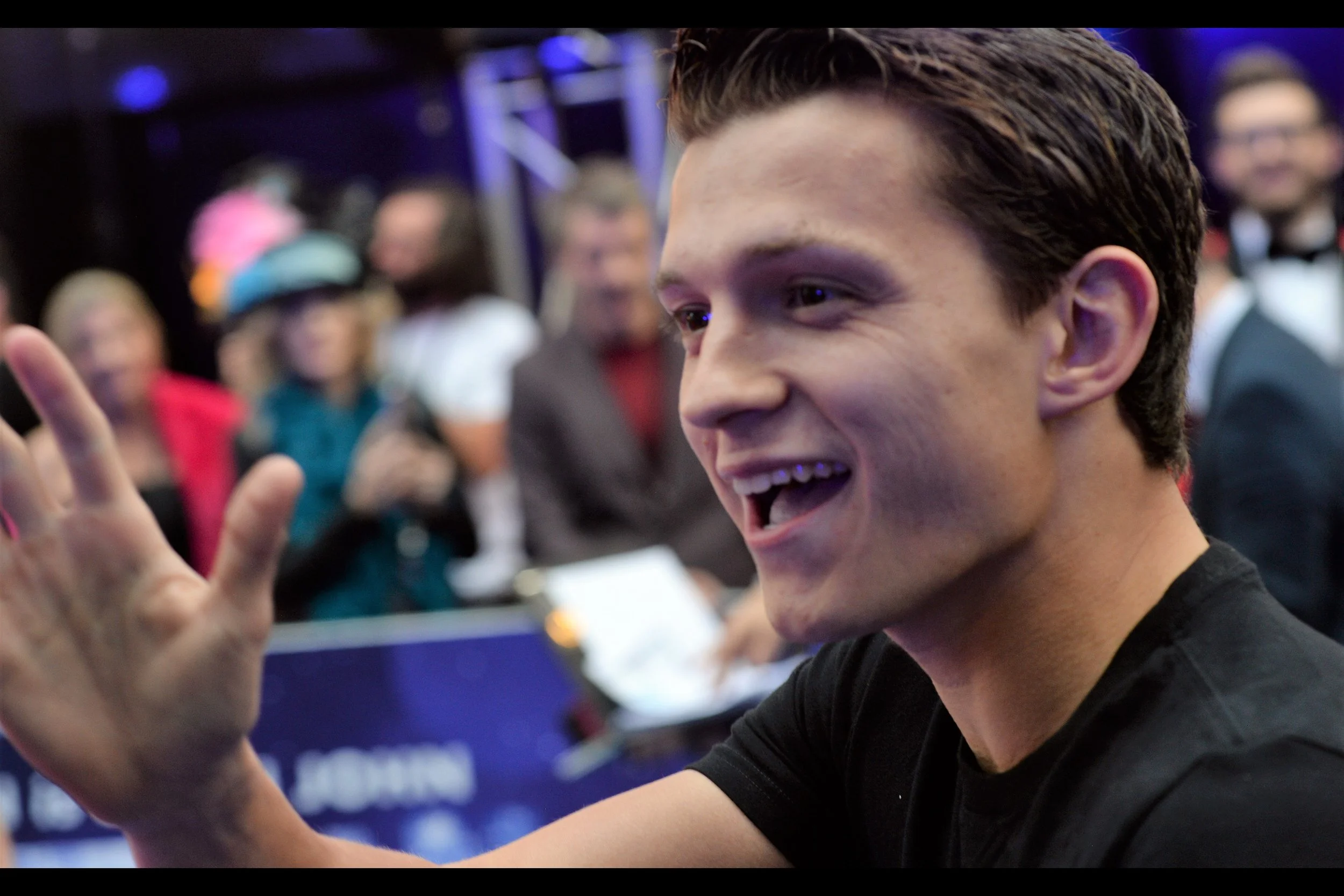Random attendee : the third (and current) Spider-Man - Tom Holland, who zipped by so fast that I barely had time to raise my camera (the one with the long-range zoom set to “full”). This photo alone, blurry or otherwise already makes this a better Avengers premiere than the last one .