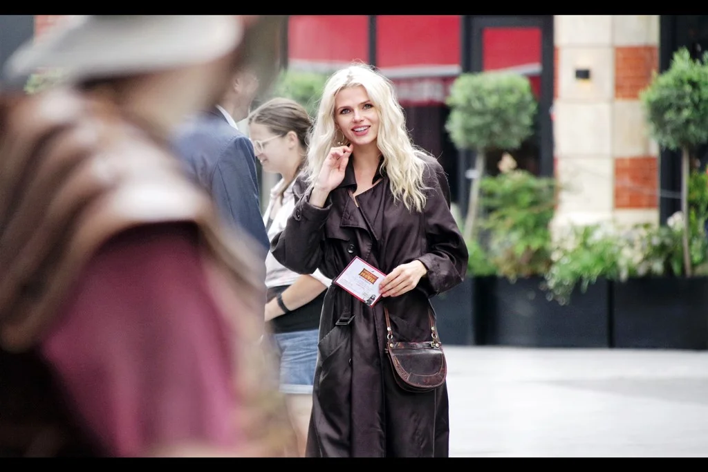 “Me? Just standing here looking pretty. You? Presumably not doing the same” Harsh. Also, I don’t know who this is.