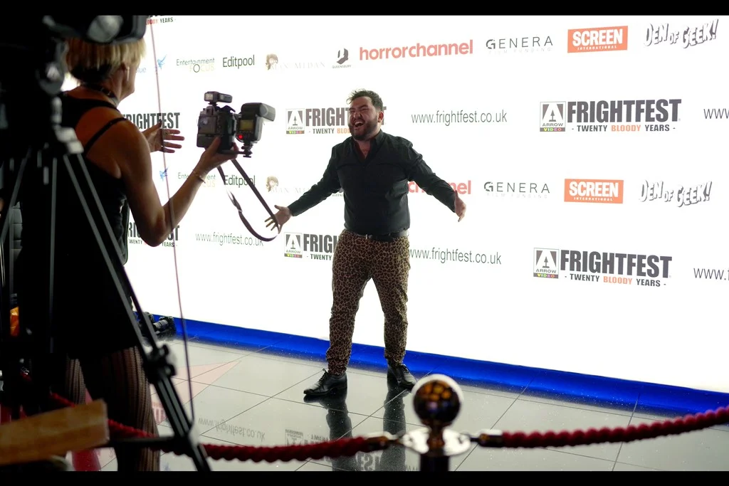 “Free Hugs! At Frightfest! Live Dangerously! C’MON!!!!”