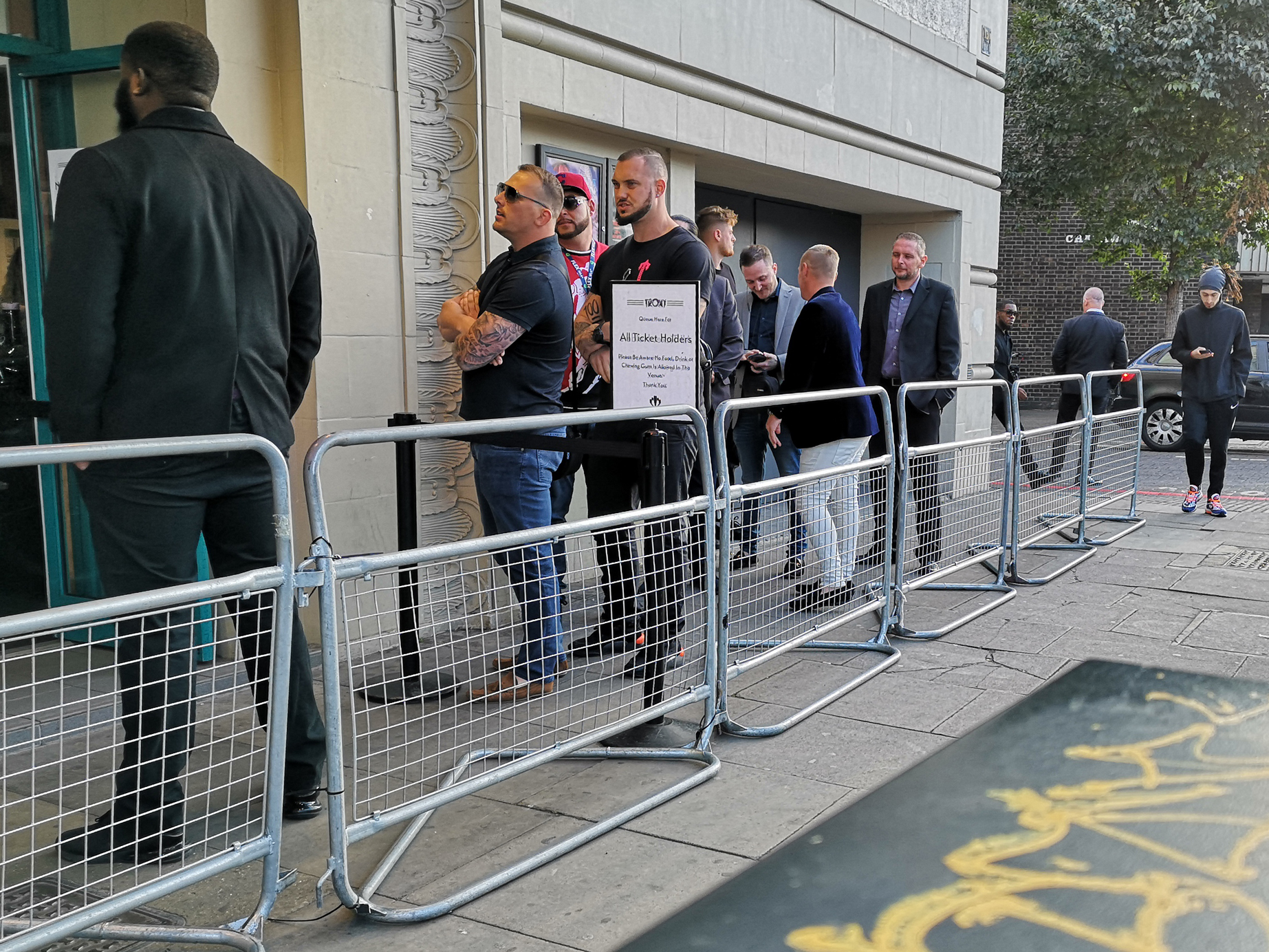 The queue for ticketholders is much more intimidating,to the point where I think security might not even check whether these people actually have tickets. Also that man’s beard is amazing.