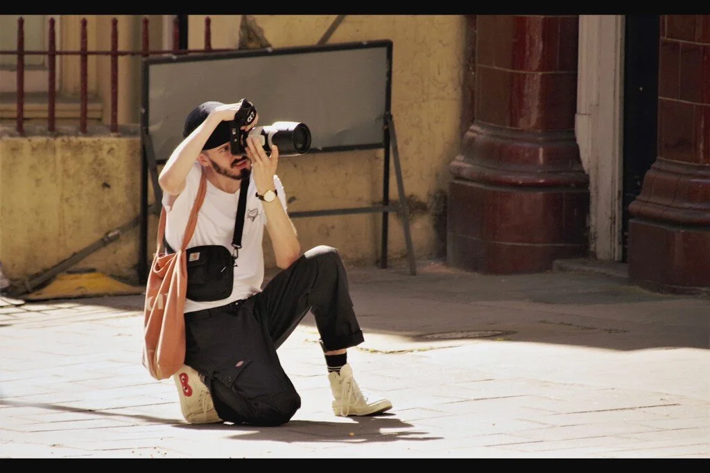 “Of course I take my architecture photography seriously. And that doric column is totally flirting with me”
