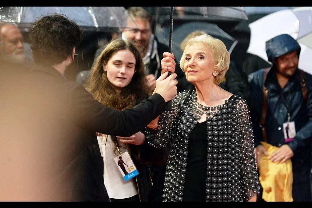 Sadly, wireimage does not reveal who this is, but she was interviewed and she was photographed by the paparazzi. I’m going with ‘wealthy financial backer with possible underworld ties’ , not because there’s any evidence of that, but because it sounds kinda edgy.