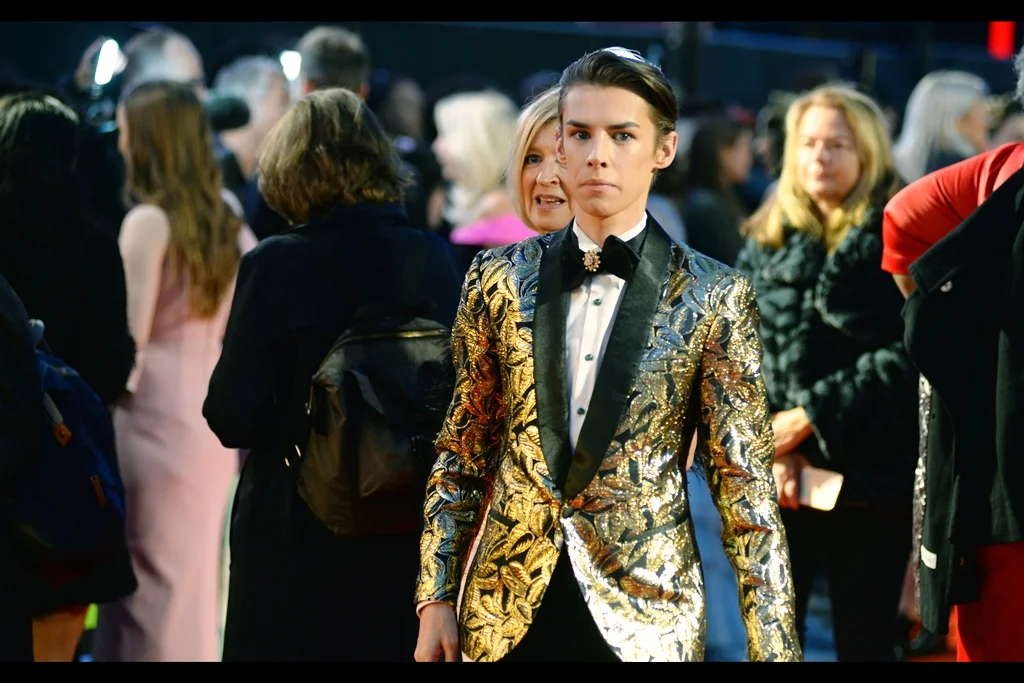 The suit is certainly sharp, and the bone structure admirable. But as we like to say in Tha Biz… he’s no Chalamet.