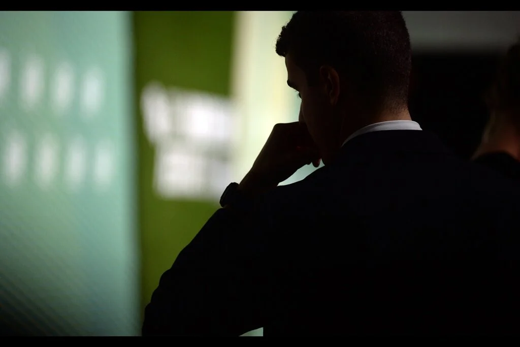 “I’m not bored. But please don’t let them see me glancing at my watch….”