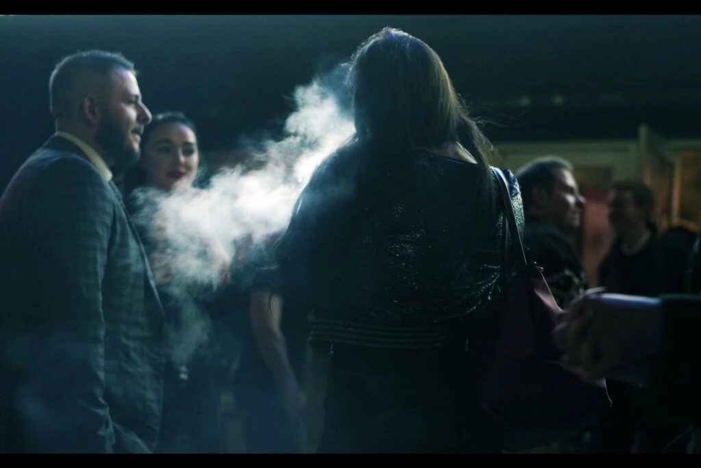 “Smoking is still cool, right?” ”Probably.” ”Does anyone know if they’ve all gone inside and whether the movie has started?”