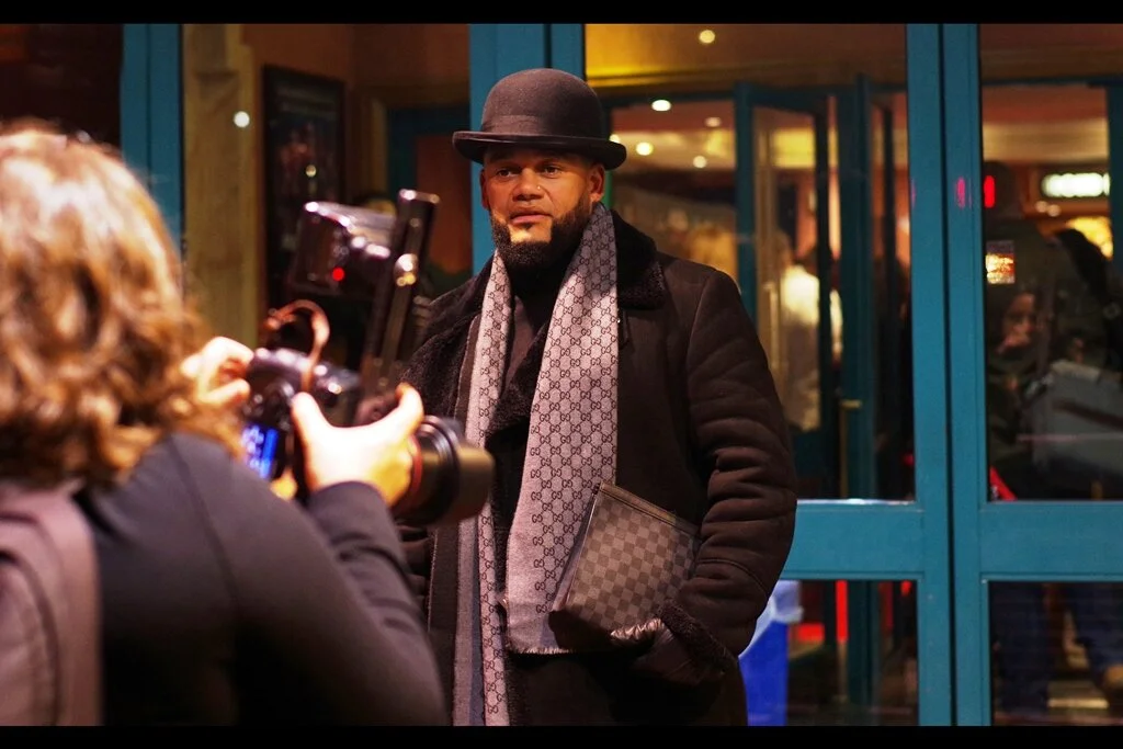 “You think you have the right to photograph me just because I’ve got a cool beard and an awesome hat? Lady, can’t you see how fantastically co-ordinated my scarf and man-bag are? ”