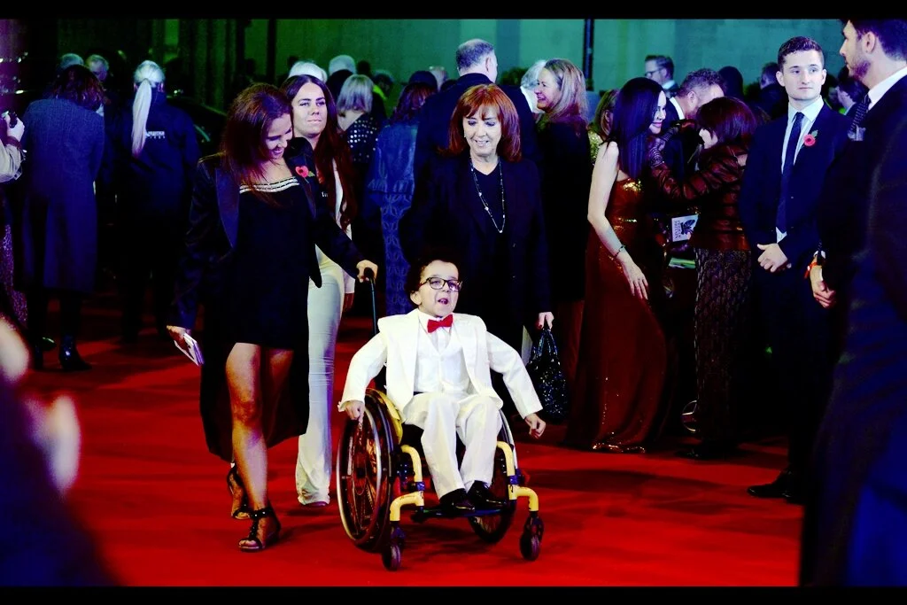 I don’t know who this is, but he was on the front page of several newspapers the next morning (and yet was not in the 614-photo, 11-page wireimage image library of the event).