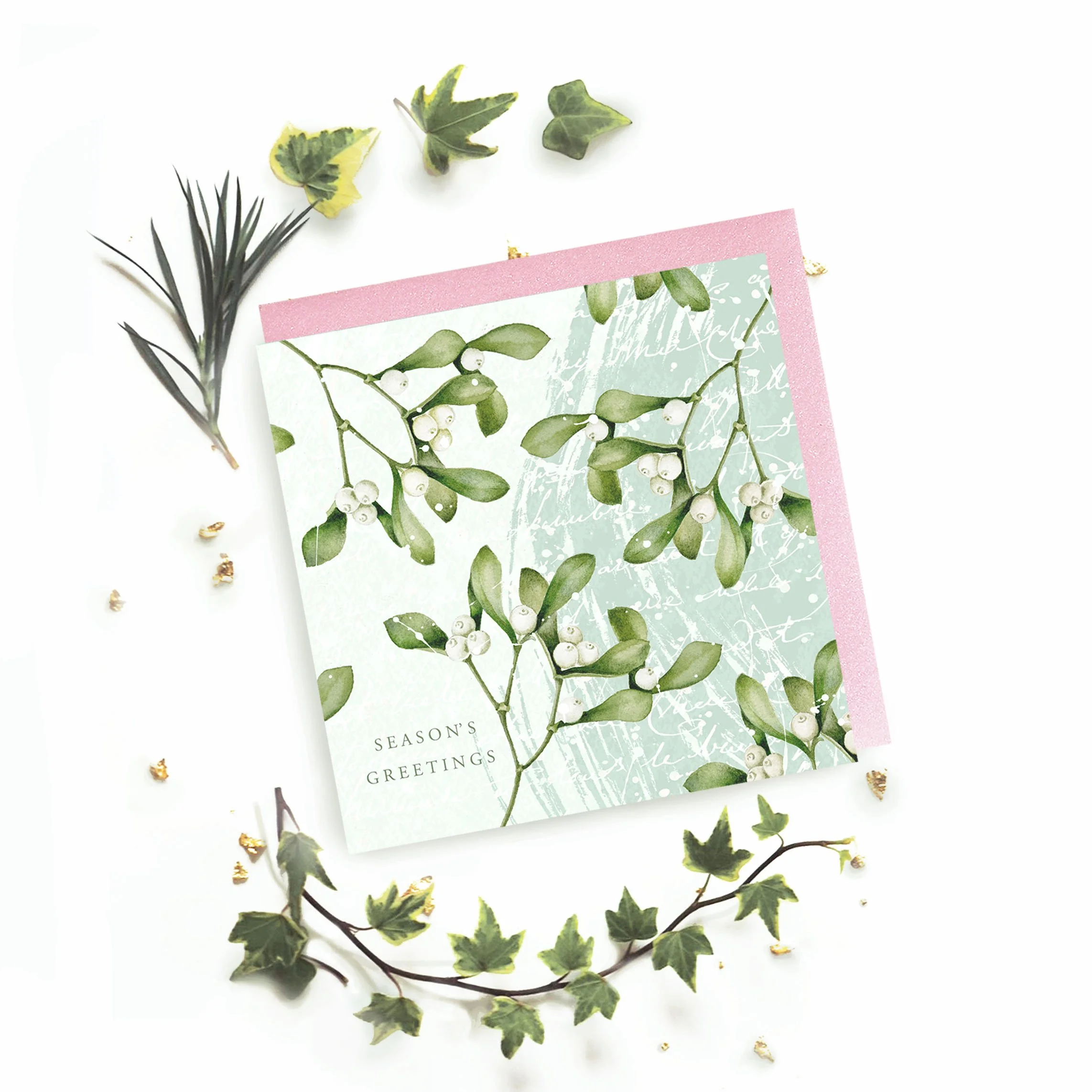 snowy mistletoe sprig Greetings Card on a white Background with pink envelope .jpg