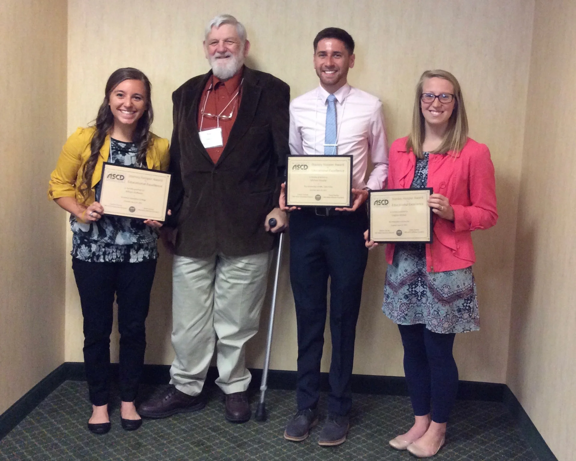 Stan Hooper and three 2017 award recipients