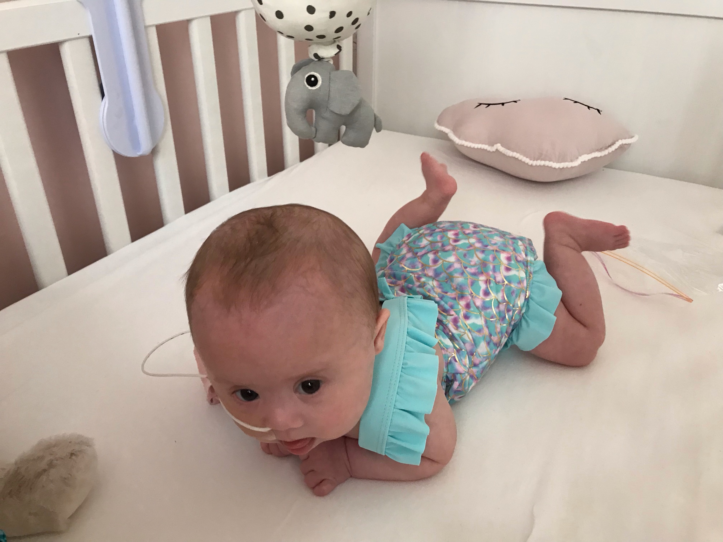 Polly’s first swimming costume for when we put her in a paddling pool, she loved the water & loves splashing about in her bath too!
