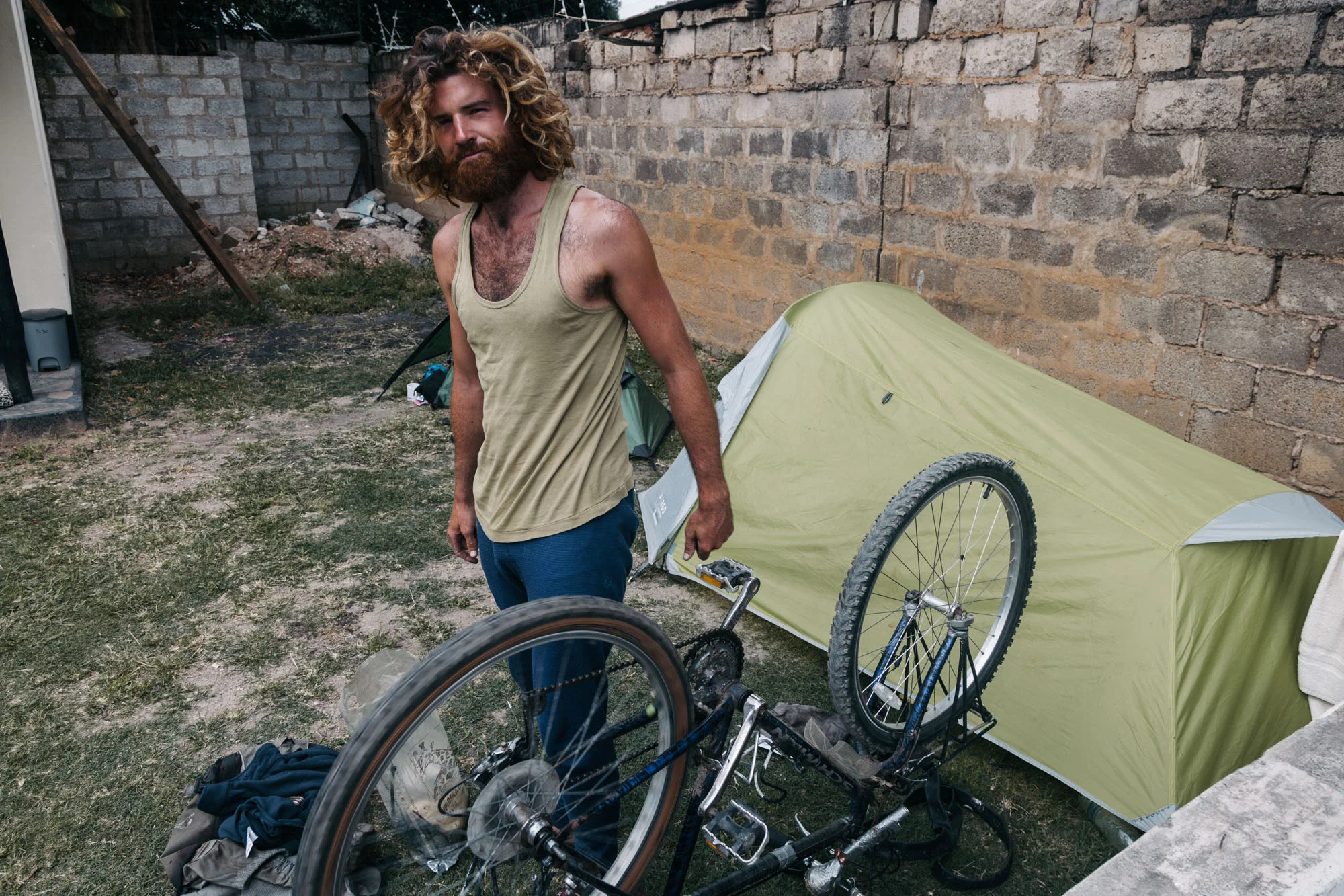 While we wait for our visas in Lusaka, Charlie gets his bike ready for the first leg of the trip.