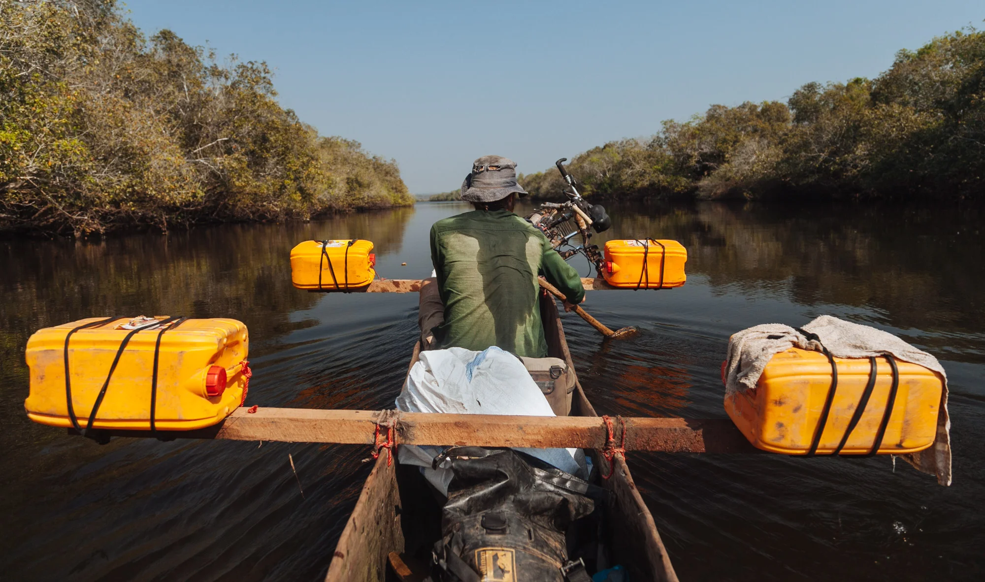 After previous experiences in Malawi with dugout canoes, we had learnt that they were not very stable so came up with this configuration in the hope of keeping us upright if we became unbalanced.