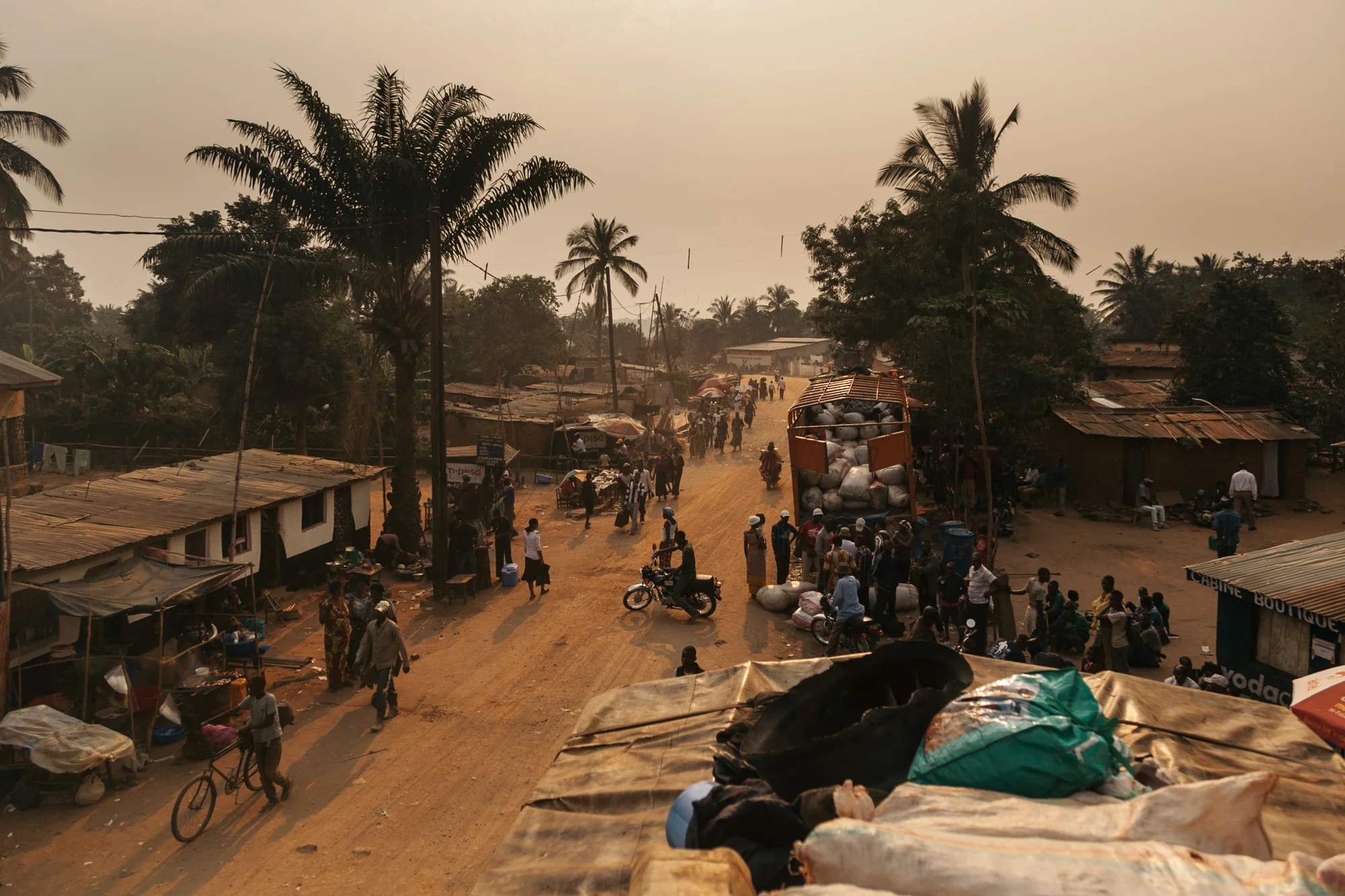 Time on our visas is running short, energy is low and the roads ahead nearly non existent. We resort to riding the trucks to the capital, Kinshasa.