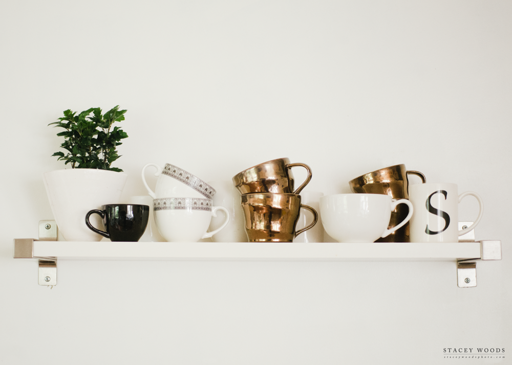 Open shelving with coffee cups