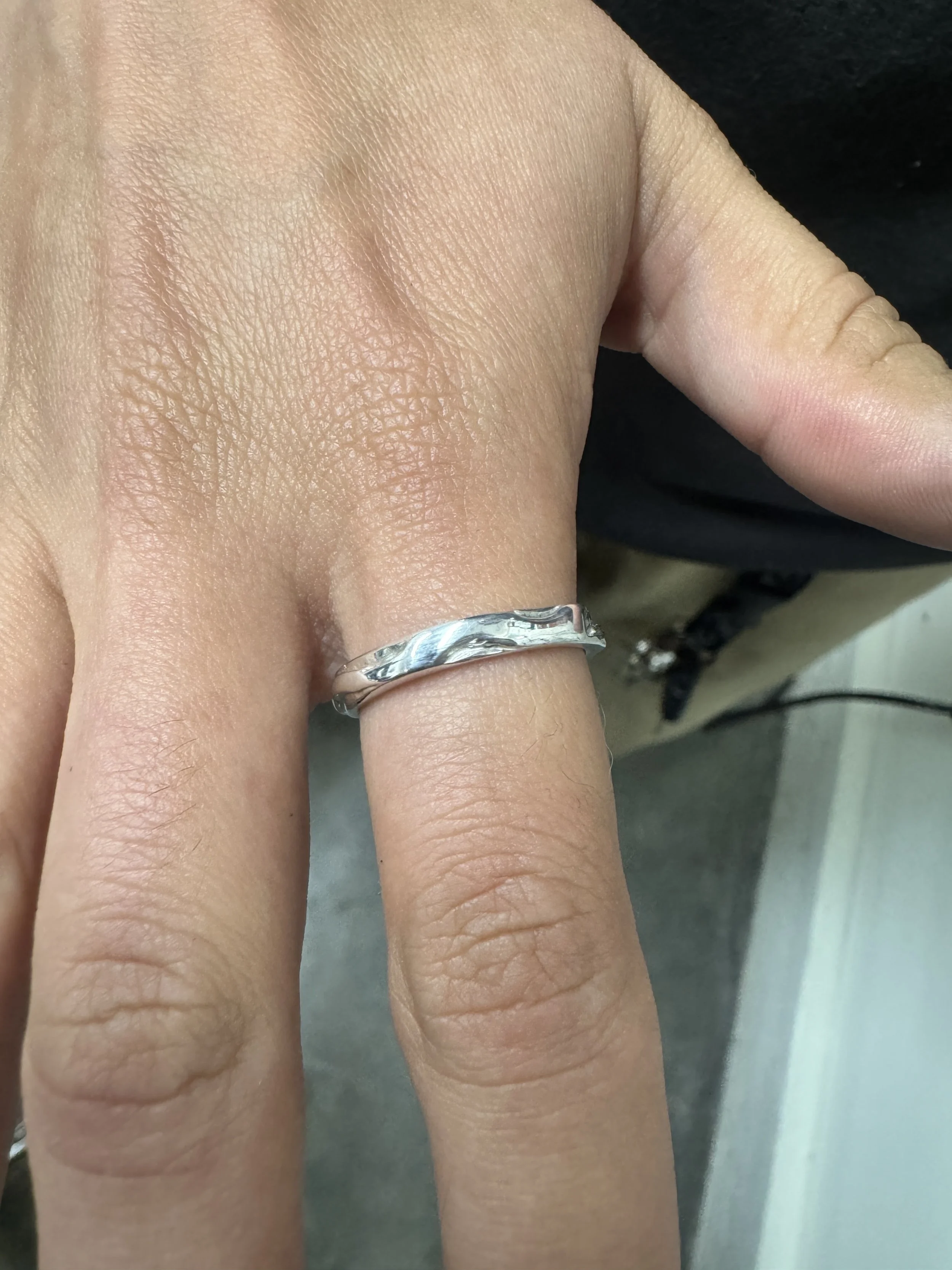organic wavy texture ring band on hand