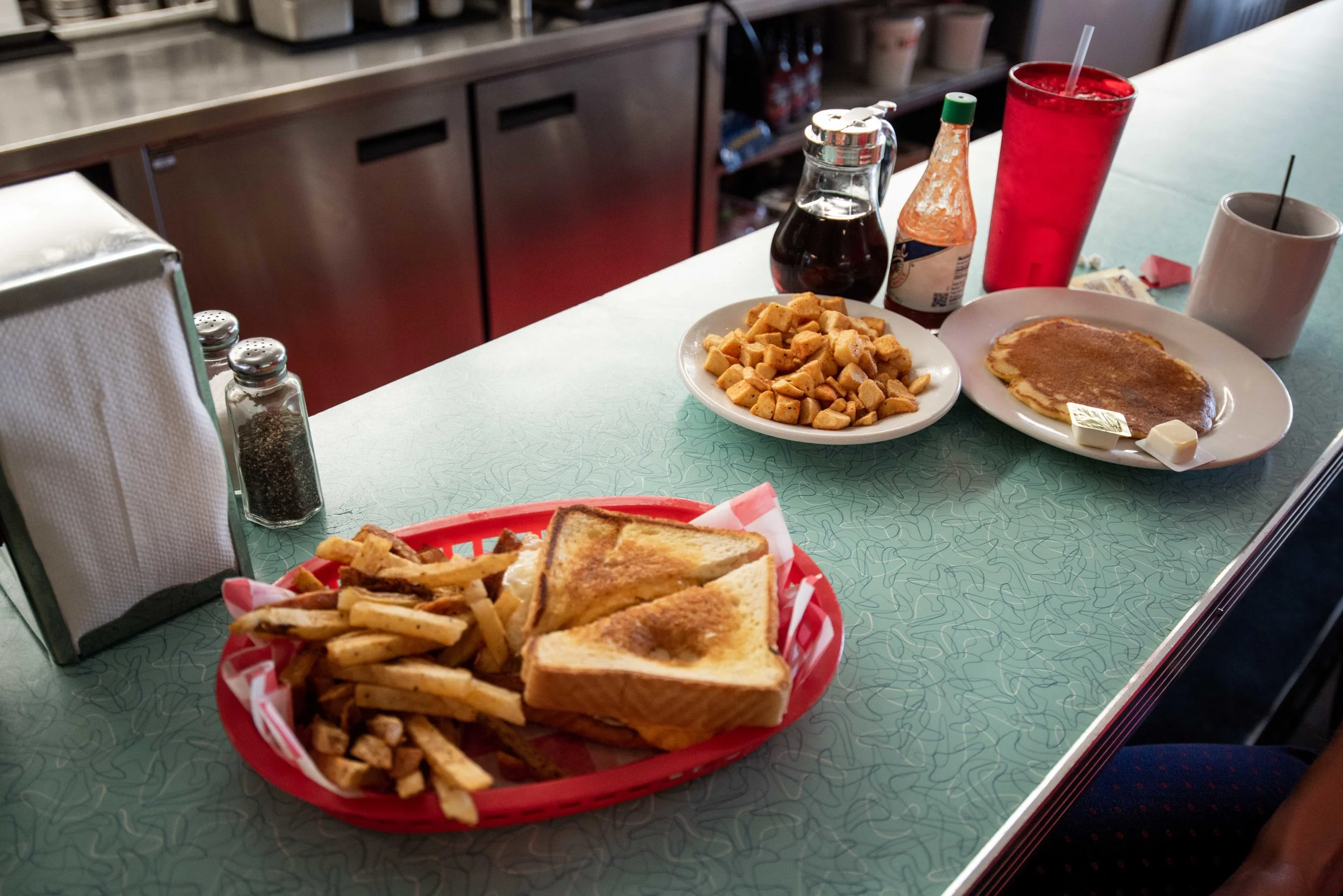 Patty melts and pancakes for breakfast.