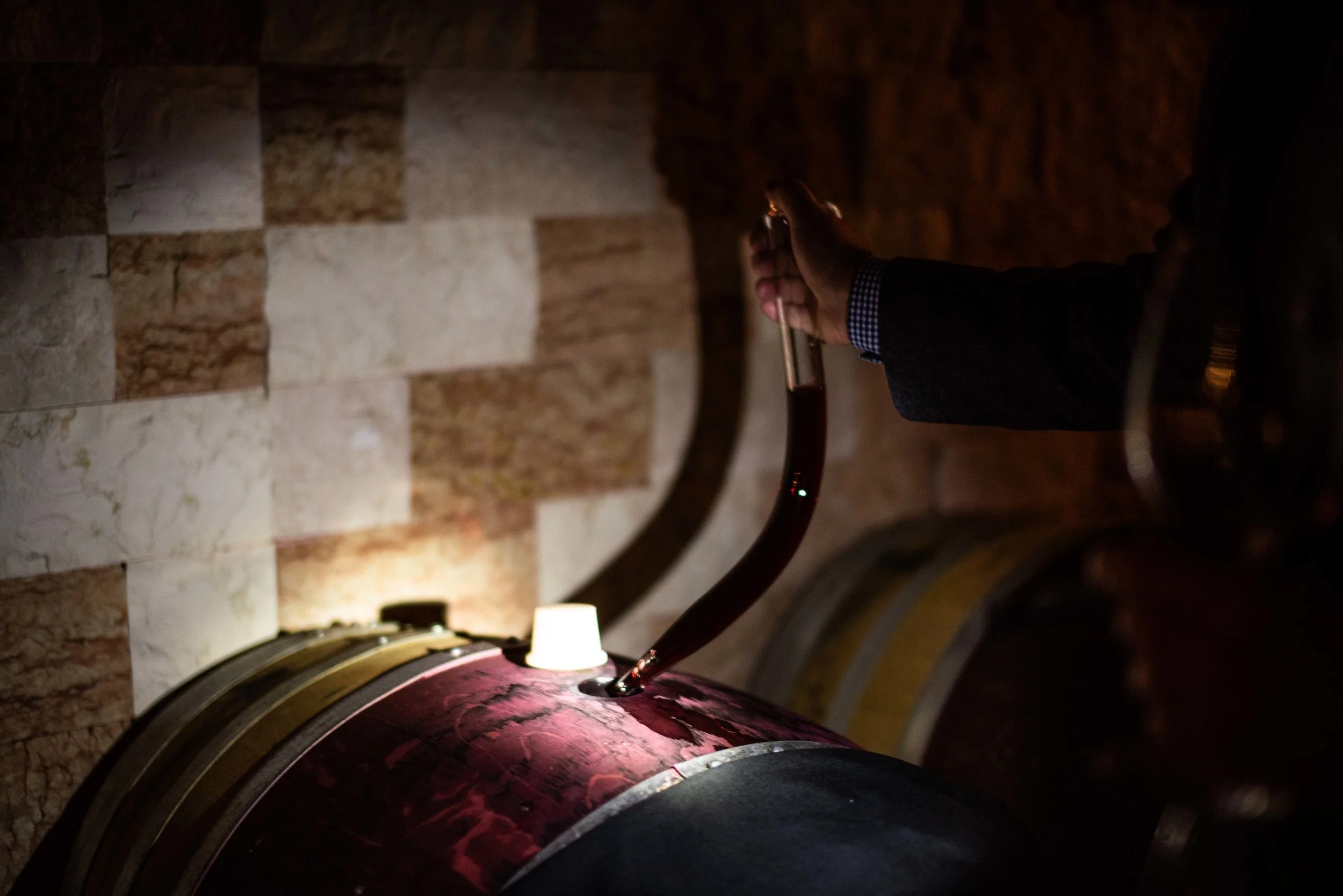 The wine thief retrieving our tastings from the barrel.