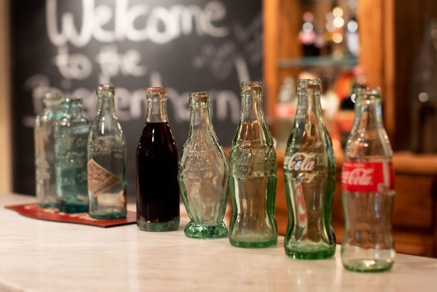 Coke bottles through the years.