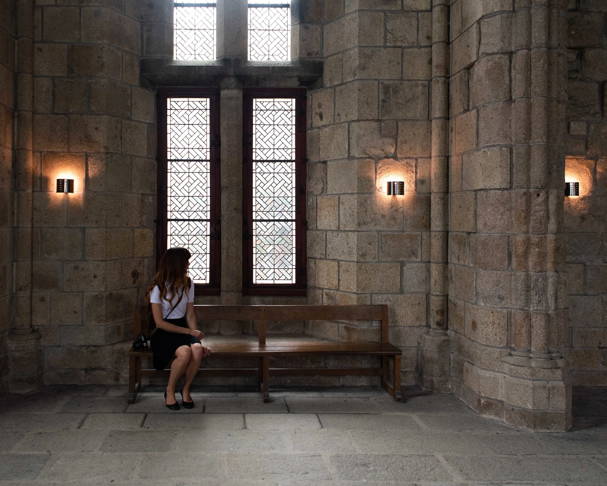 Charise sitting in the abbey.
