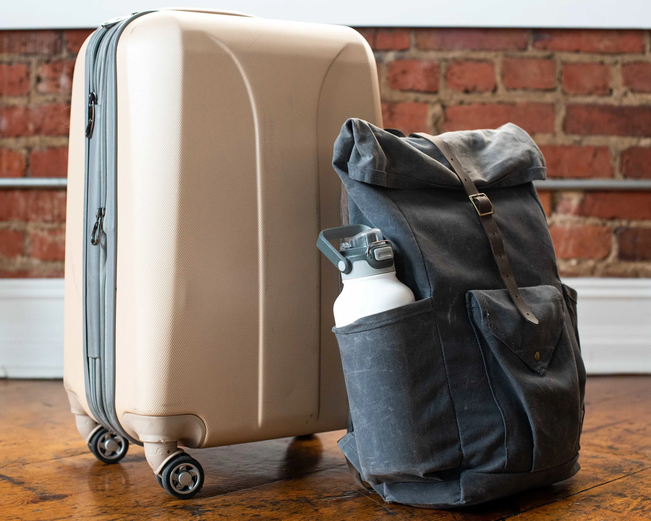 Samsonite suitcase and Uphill Design Crest backpack