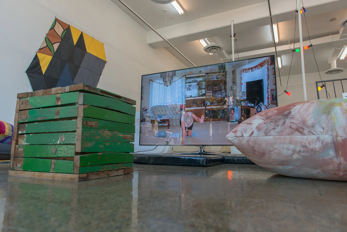 (front) Katherine Hattam , Specific Object (Green, Yellow, Red), wood. Courtesy the artist and Daine Singer. Natasha Madden, Be My Love (Macbook Duet) , 2014, Digital Film on USB, TV, Nanna's Fabric. Courtesy the artist. Lucina Lane (background) Alek O. , Untitled (Umbrellas) , 2015, Polyester Fabric from Umbrellas. Courtesy the artist and Frutta Gallery, Rome. Tony Schwensen , Elegy to the Australian Republic ( Motherwell avoids relegation) , 2003, concrete, pvc, buckets, lights. Courtesy the artist and Sarah Cottier Gallery.