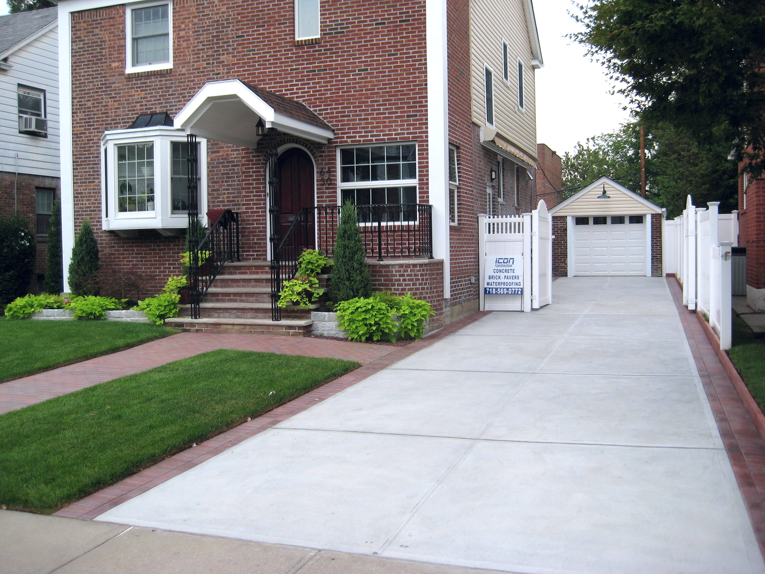 Concrete driveway with Paver border. 