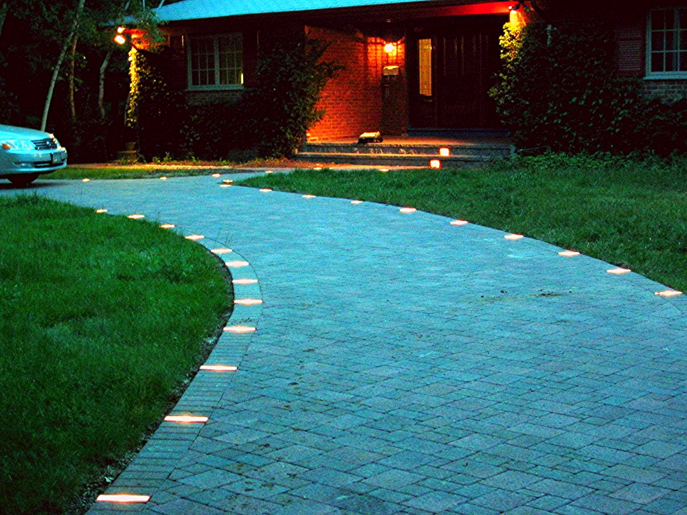 Circular Driveway with 3 piece pavers and low voltage lighting. 