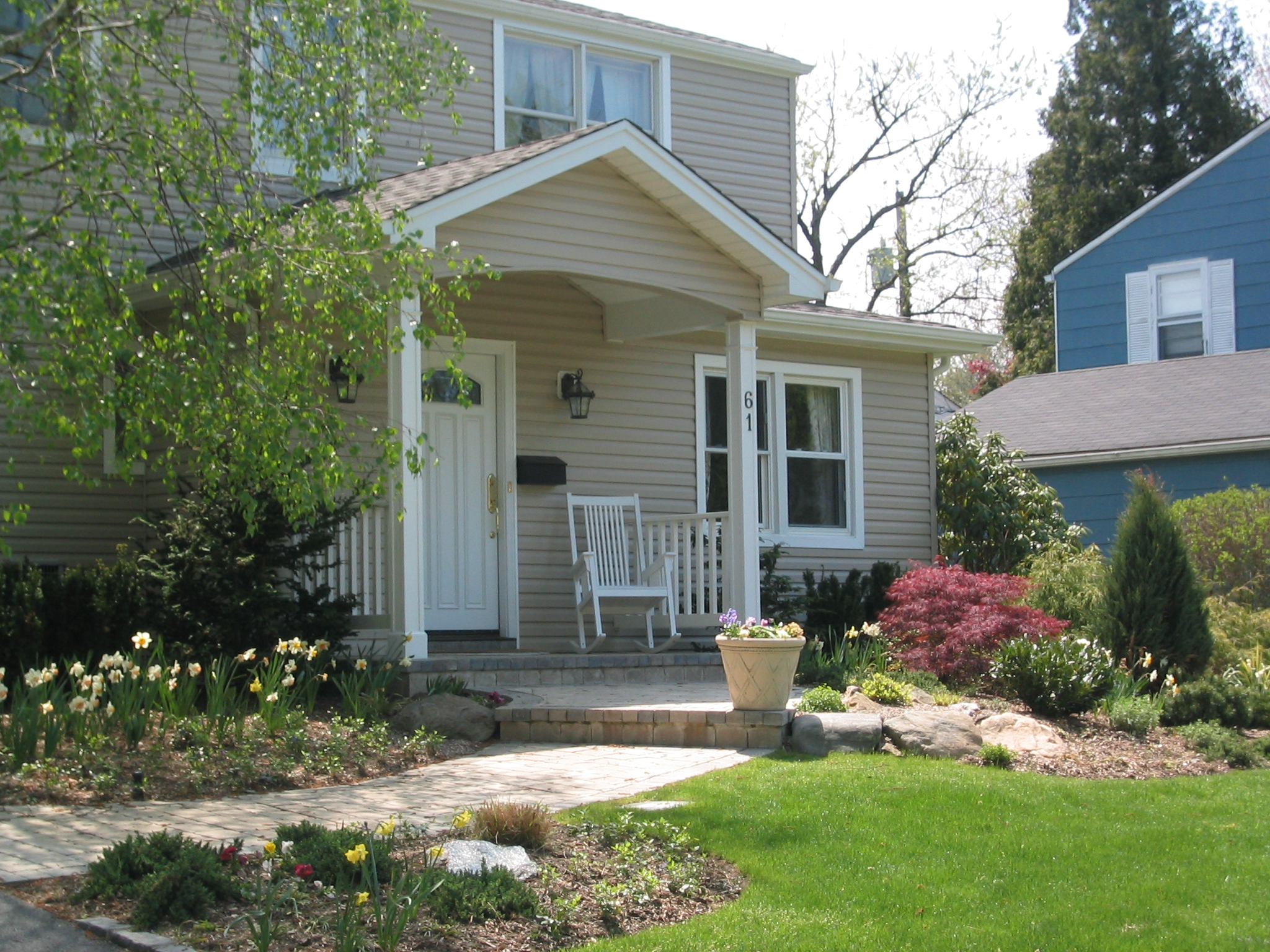 Paver walkway, step and top landing. Rocking chair not included. 