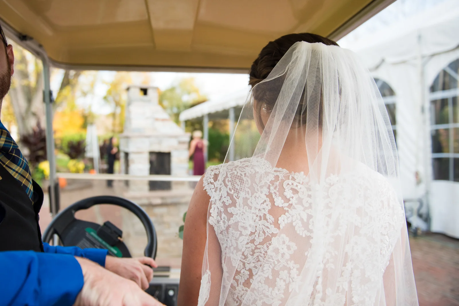 The royal treatment - Molly rode in a golf cart on her way to surprise Ryan for their 'first look' pre-ceremony