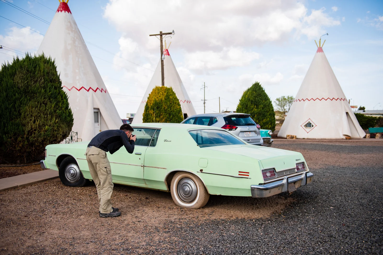 Kris photographing among the wigwams