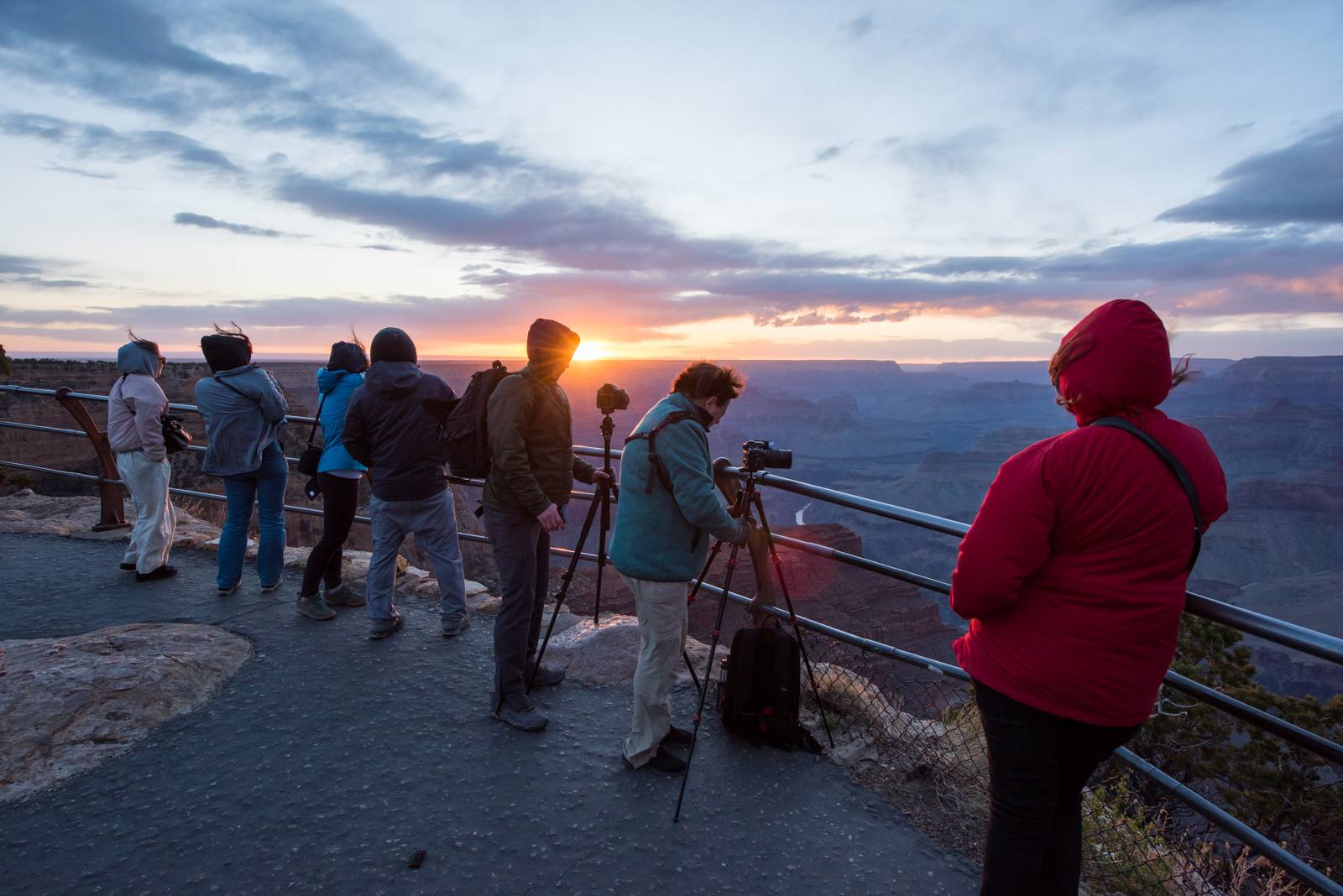 Sun flare & photographers, toughing it out for sunset
