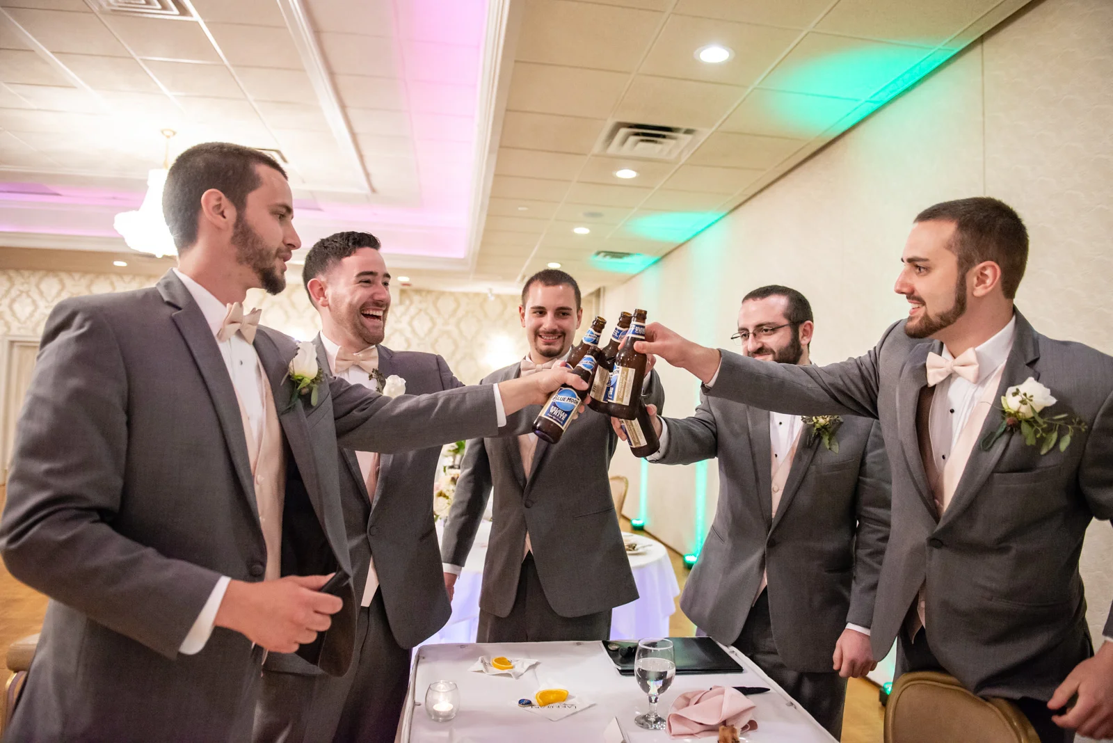 The groomsmen, cracking open some cold ones.