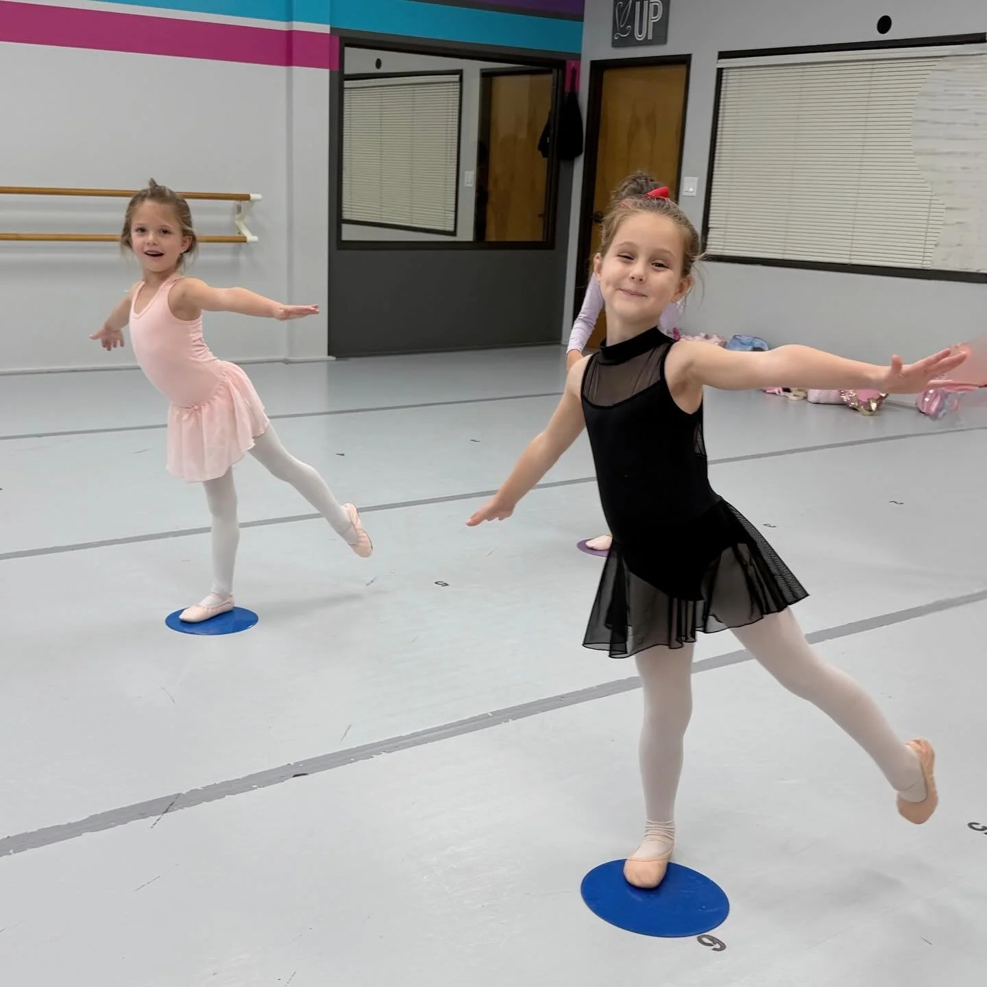 Confident Smiles are the Best! These girls and their classmates love showing off their arabesques in class. 😀 🩰 🩷