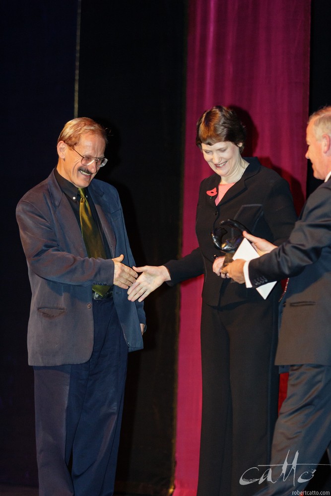  Jack Body receiving the Arts Foundation Laureate Award from Prime Minister Helen Clark, at the St James Theatre in Wellington, 2004. 