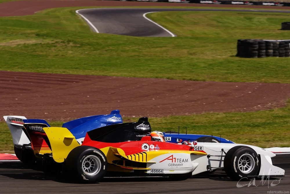 Nico Hulkenberg and Loic Duval in the A1 Grand Prix race.