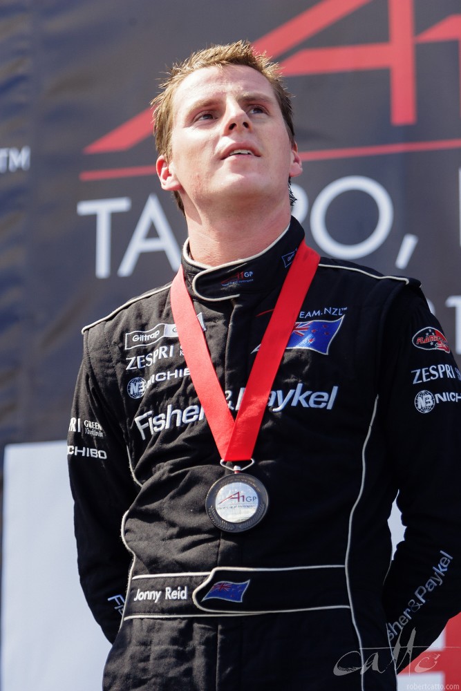  New Zealand driver Jonny Reid on the third step of the podium in Taupo. 