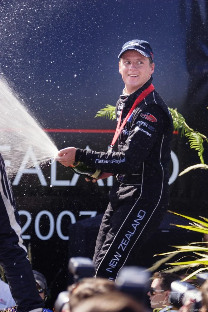 Jonny Reid celebrates third place.