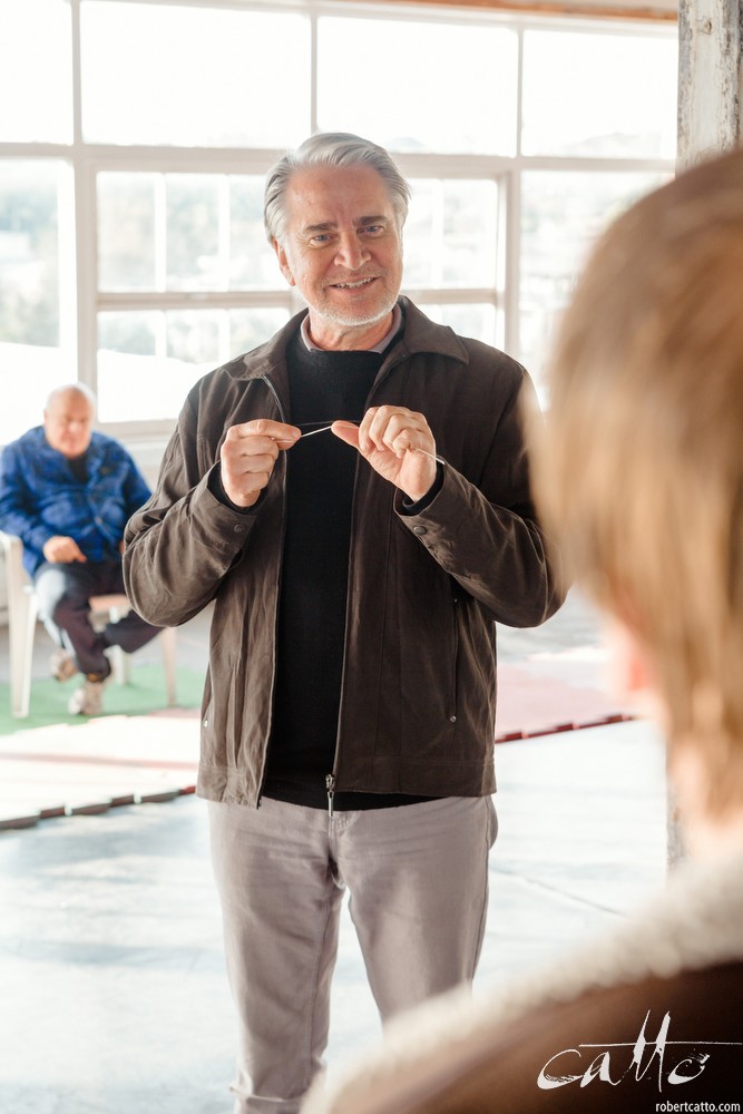 Danny Adcock, Noel Hodda, Jamie Oxenbould & Richard Sydenham rehearse with director Glynn Nicholas for Apocalypse Theatre's production of The Dapto Chaser, by Mary Rachel Brown, on Tuesday, 23 June, 2015. The show takes place at Griffin Theatre from 1 - 15 July, 2015. Photo by Robert Catto / robertcatto.com.
For the Sinclair family, the cut-throat world of greyhound racing is a religion. And their beloved dog Boy Named Sue is more than a greyhound; he’s their heart and soul on four legs. With the crucial Winnebago Classic on the horizon, Cess Sinclair has one shot at reversing his family’s fortunes for good. Against all the odds, he’s betting on a miracle.
The Dapto Chaser is warts-and-all Australian comedy that gets its hands dirty with the adrenaline, sweat and guts of the dog racing sub-culture. The Sinclairs are a family trapped in the pressure cooker of gambling addiction and when things don’t go to plan, they are forced to gamble the most important commodity of all – their relationship to each other.
Playwright Mary Rachel Brown wrote The Dapto Chaser perched in the bleachers track-side, while director Glynn Nicholas will be going on an all-schnitzel diet to get it over the line.