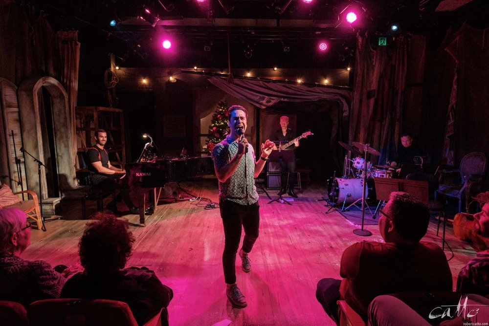  Ryan Gonzalez - dubbed the Steven Bradbury of Sydney’s musical theatre scene just moments before, by host Toby Francis - sings All I Want For Christmas. 