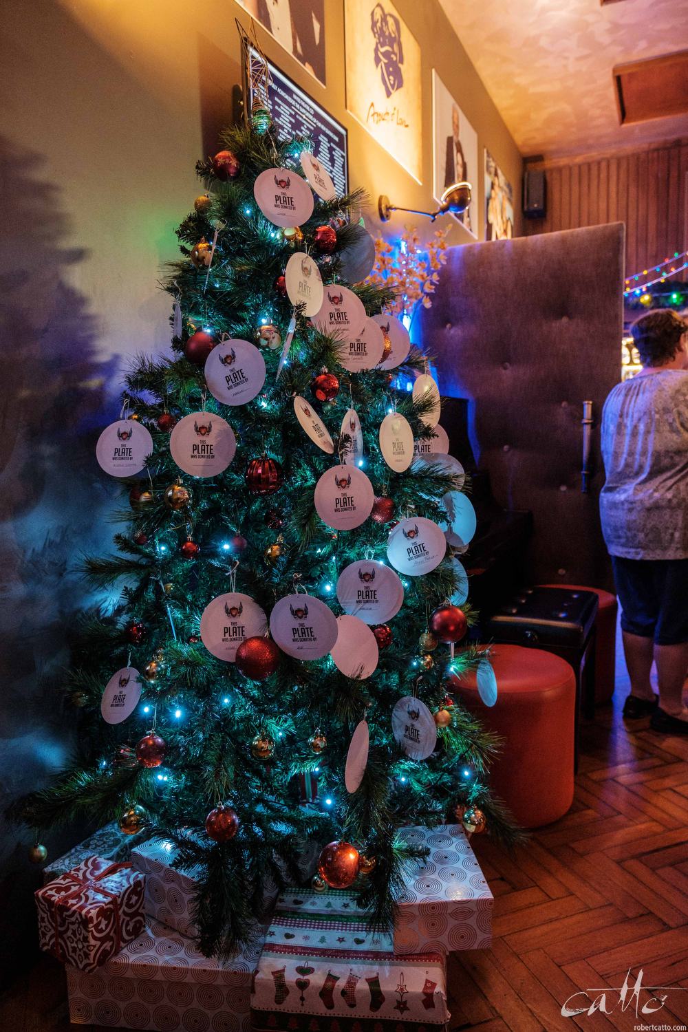  Plates representing donations to the Wayside Chapel from audience members overwhelming the Christmas Tree in the lobby at the Hayes Theatre. 