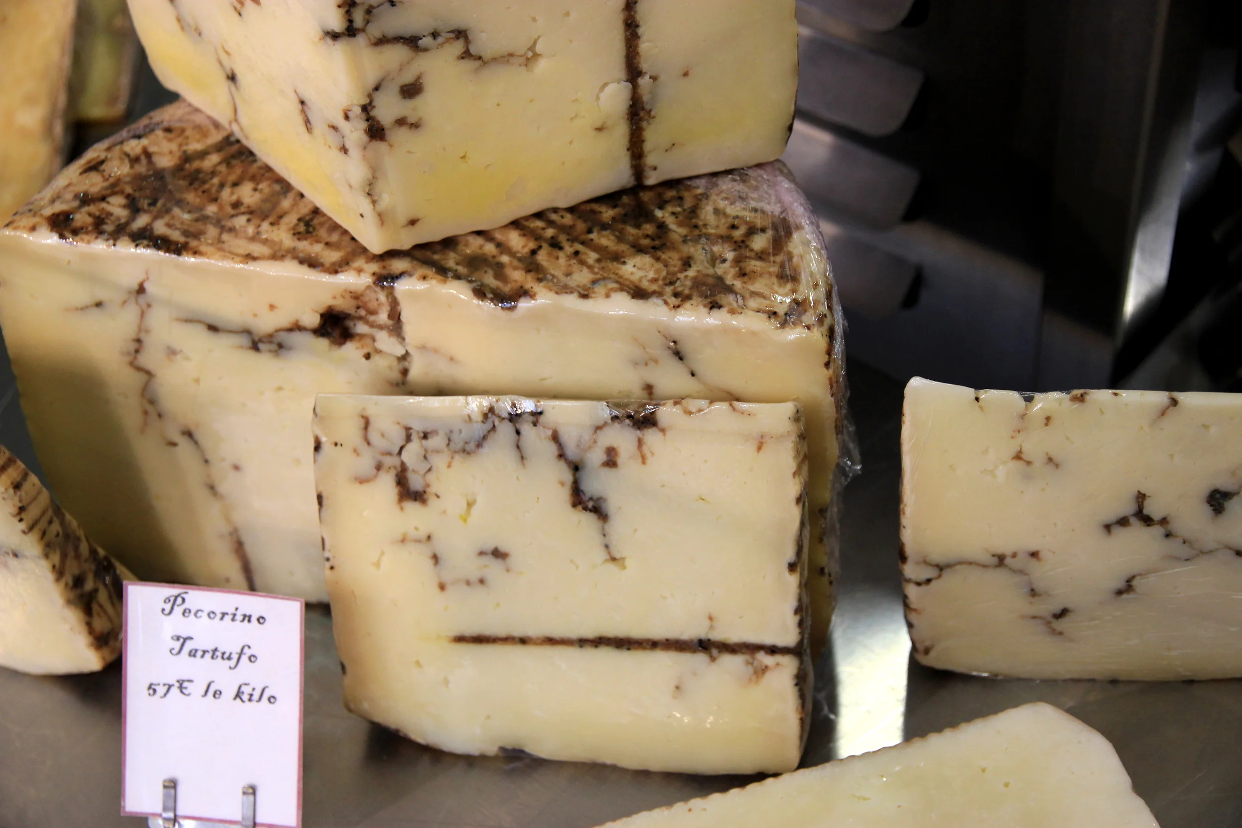 Pecorino cheese with truffles. Completely outrageous. / Fromage italien pecorino avec des truffes. Incroyablement, scandaleusement délicieux.