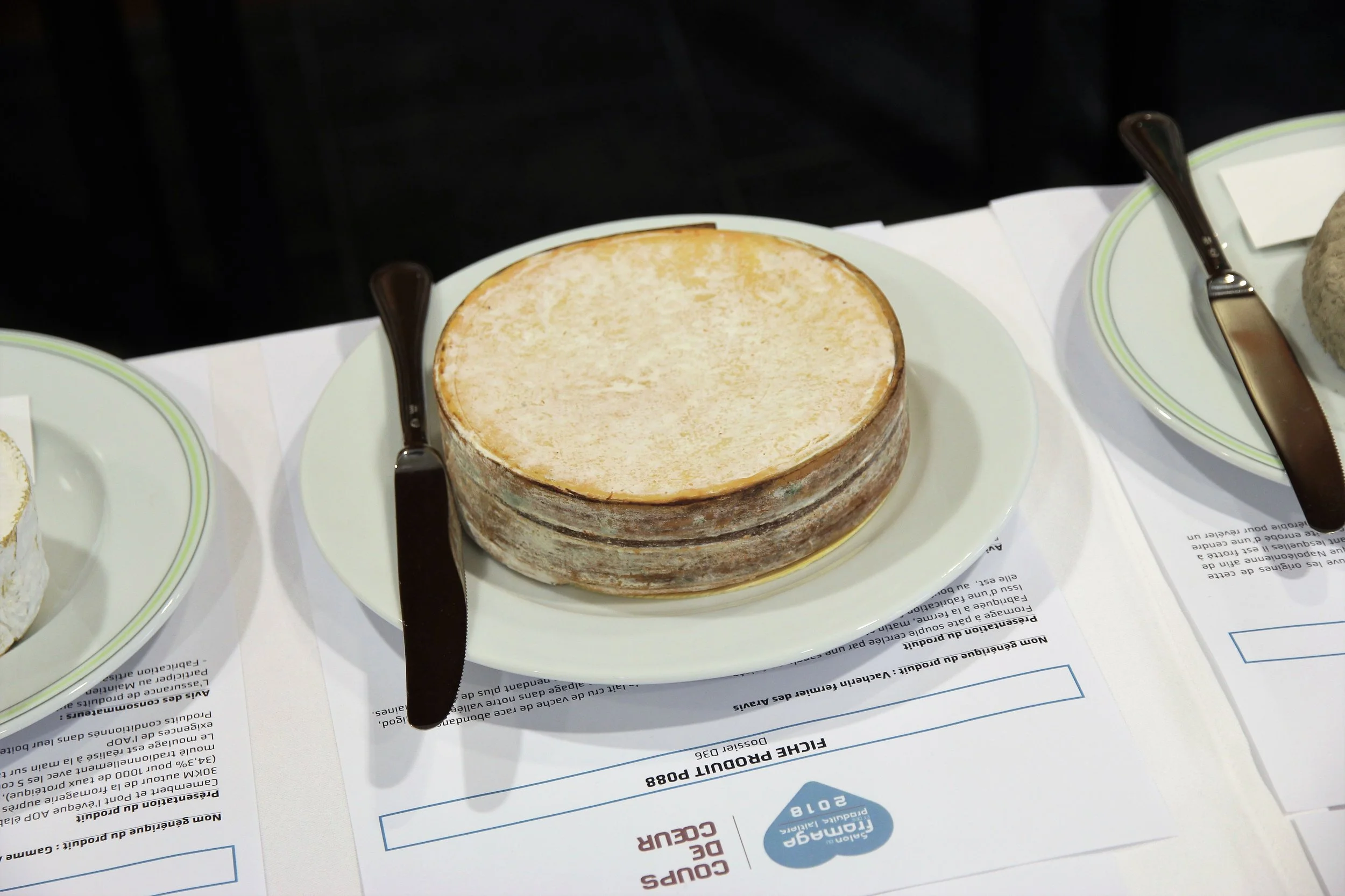 A before shot of one of the winners: a really excellent Vacherin Fribourgeois. The wood band (spruce) imparts a subtle woody, almost smoky flavor.
